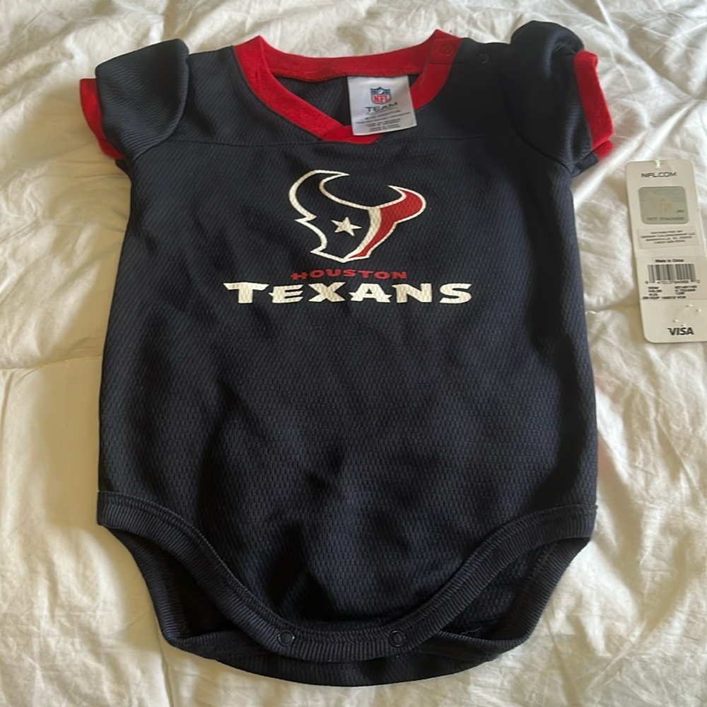 NWT Houston Texans. Onsesie, never worn, girls 12 mos